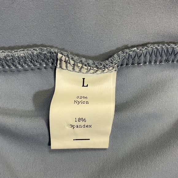 Halara High Waisted Ruched Asymmetric Hem 2-in-1 Side Pocket Mini Yoga Skirt - Picture 4 of 4